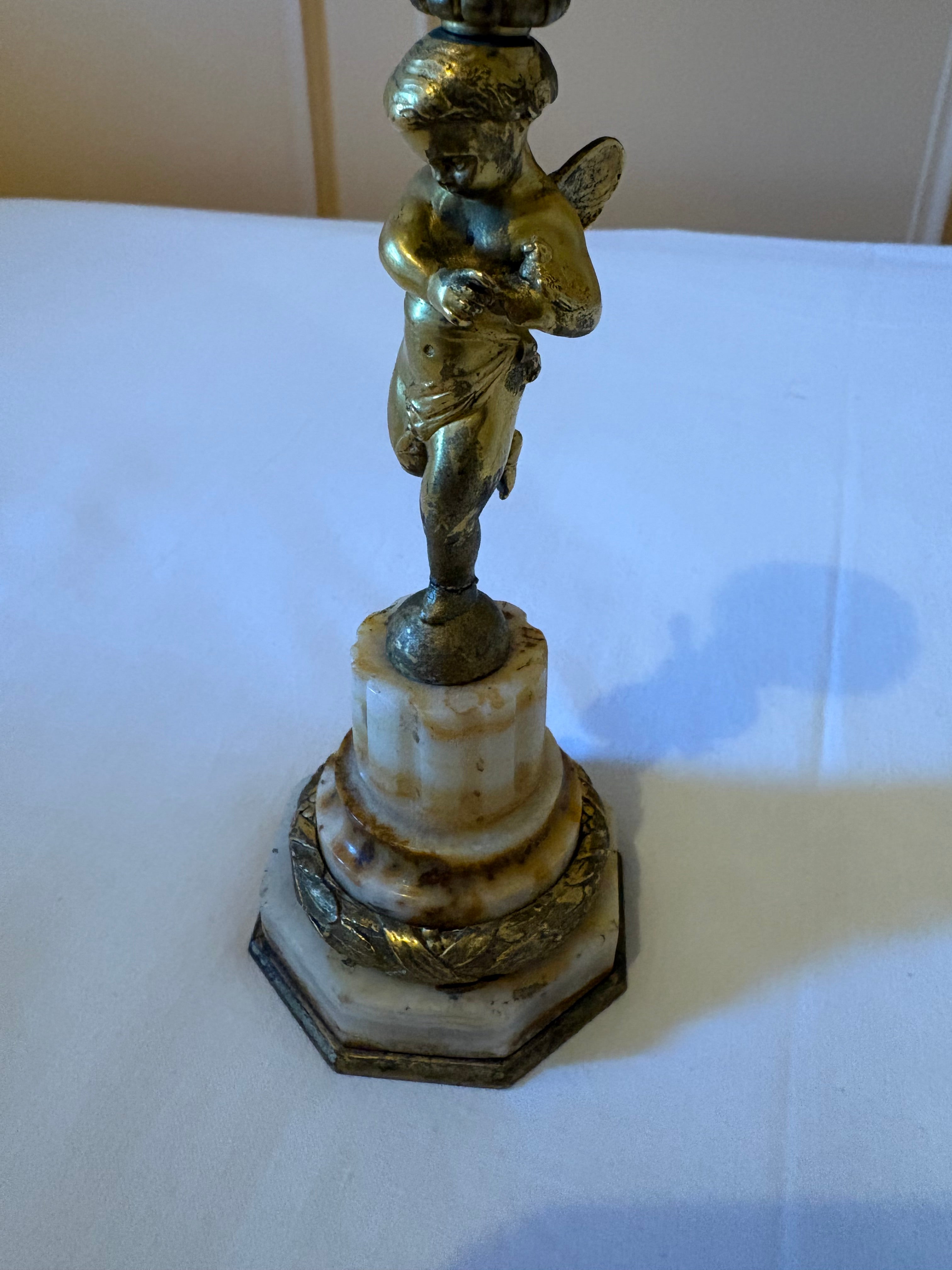 Antieke kandelaars met figuur van cherubijn 19 eeuw